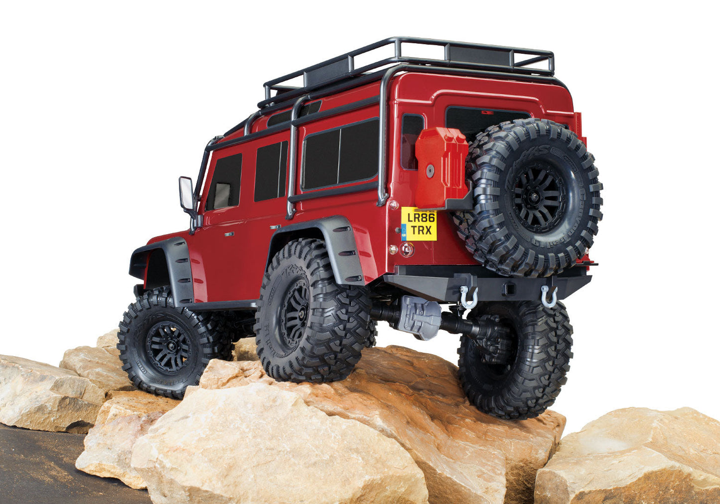 Traxxas TRX-4 Land Rover Defender 82256-4 - Red 3/4 trasera sobre rocas