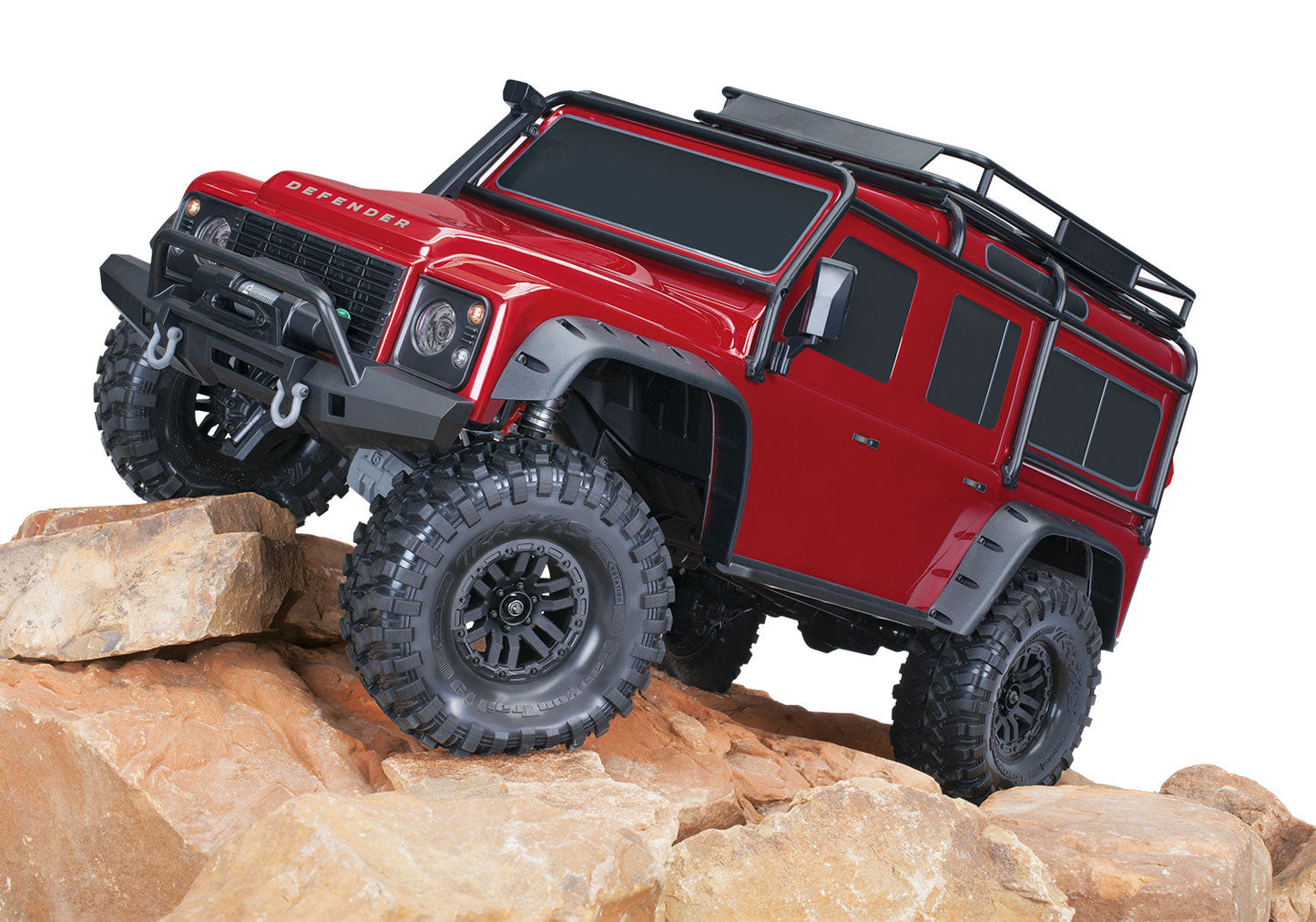 Traxxas TRX-4 Land Rover Defender 82256-4 - Red sobre rocas