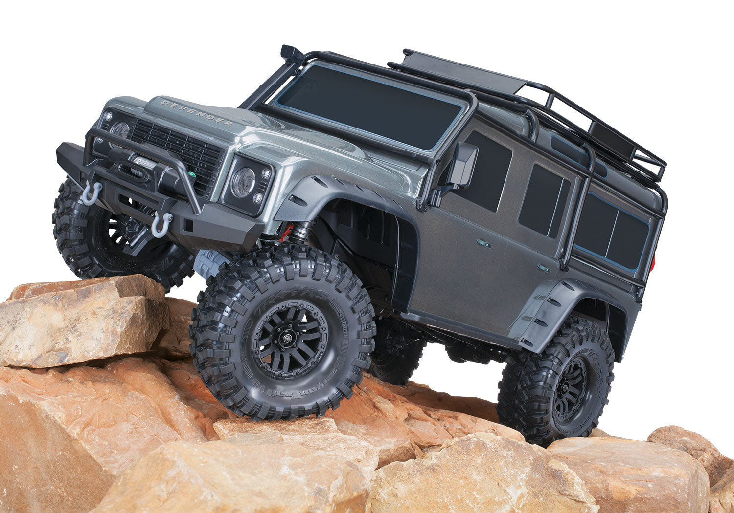 Traxxas TRX-4 Land Rover Defender 82256-4 - Silver sobre rocas
